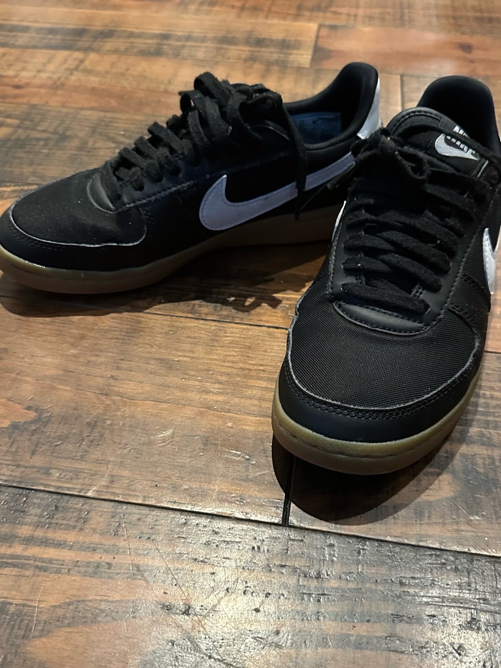Nike Women’s Black Field General Sneakers with White Swoosh